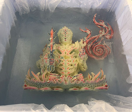 Water-soluble support material can be removed by just soaking it in water.