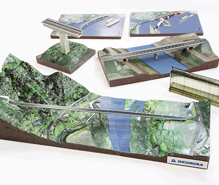 The large bridge model above in front (W75cm x D30cm) was modeled in two parts and takes around 120 hours