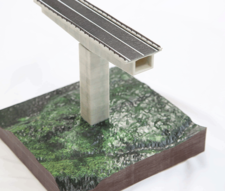 Bridge railing and the inspection passage inside the superstructure are clearly shown on the printed model